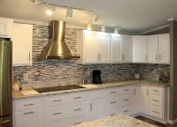 painted white kitchen with view over island